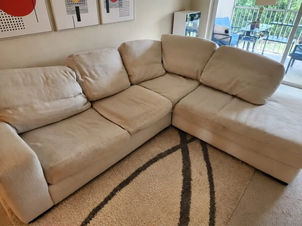 Before — Beige fabric sectional sofa before and after professional cleaning
