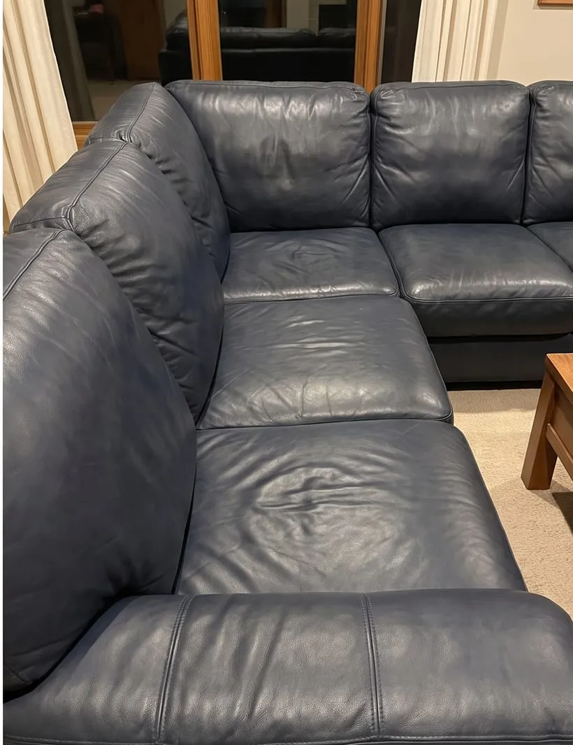 After — Blue leather sectional restored after cleaning and conditioning
