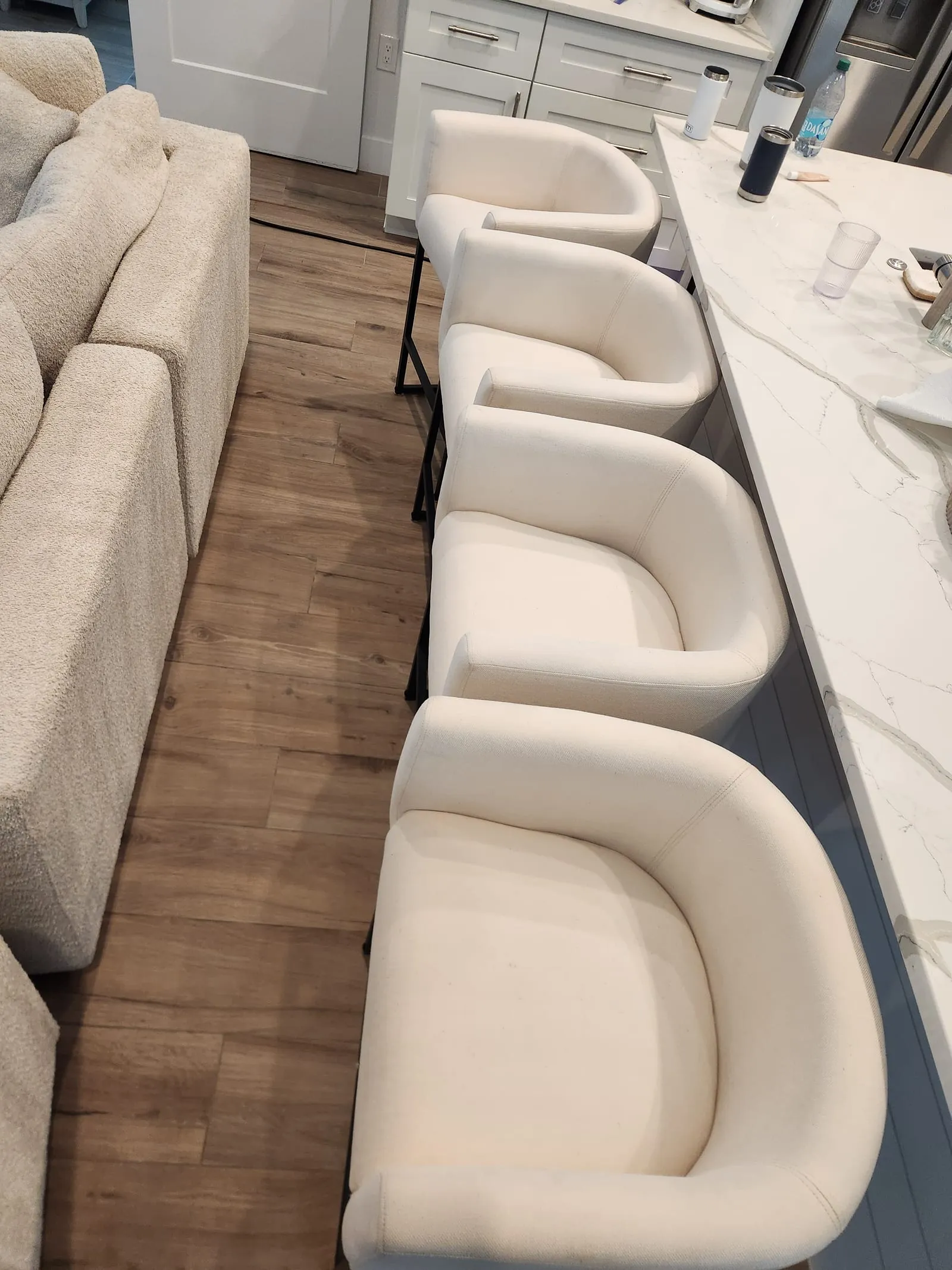 Set of white upholstered bar stools cleaned spotless