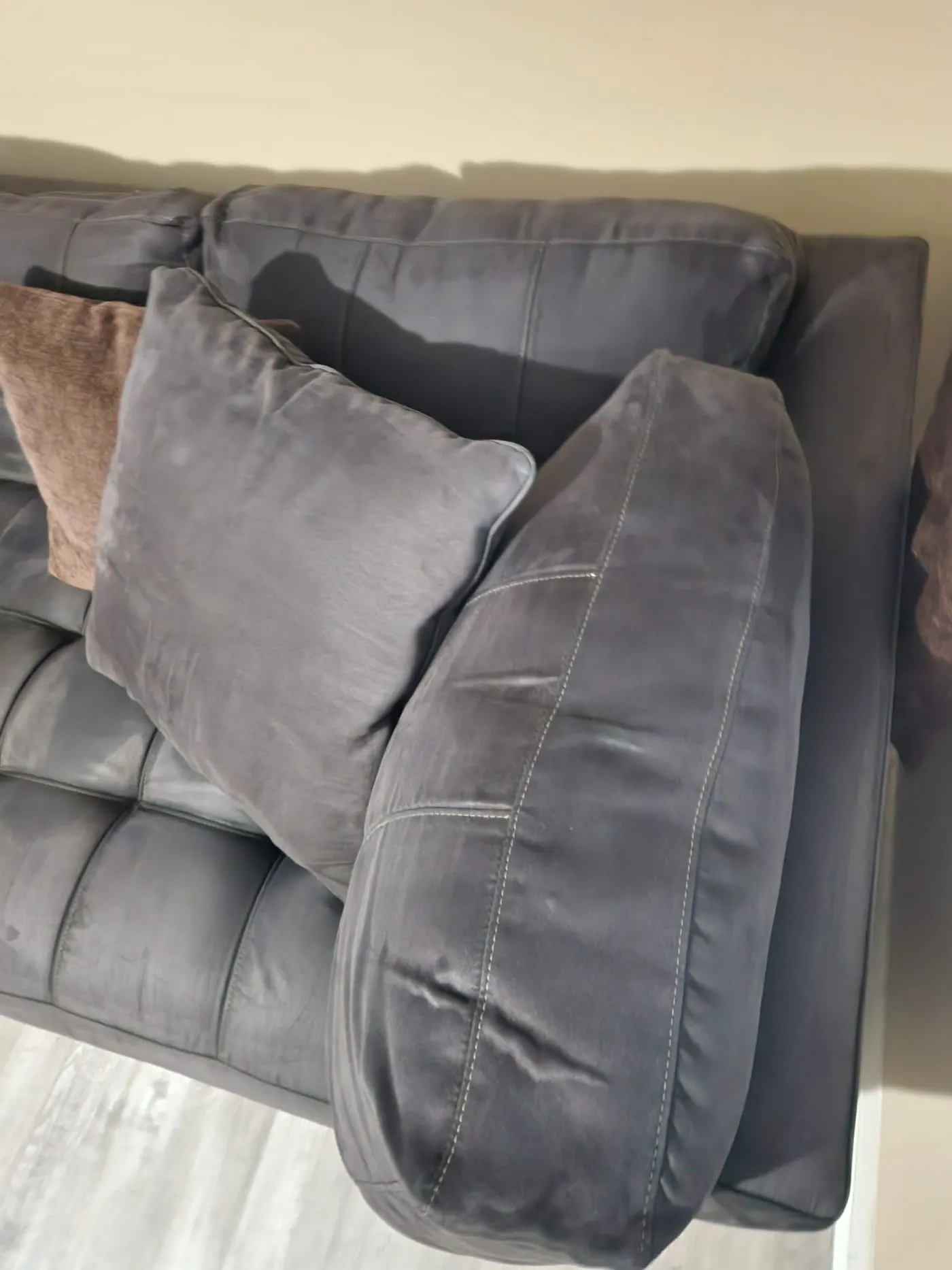 Dark grey sofa cleaned and refreshed